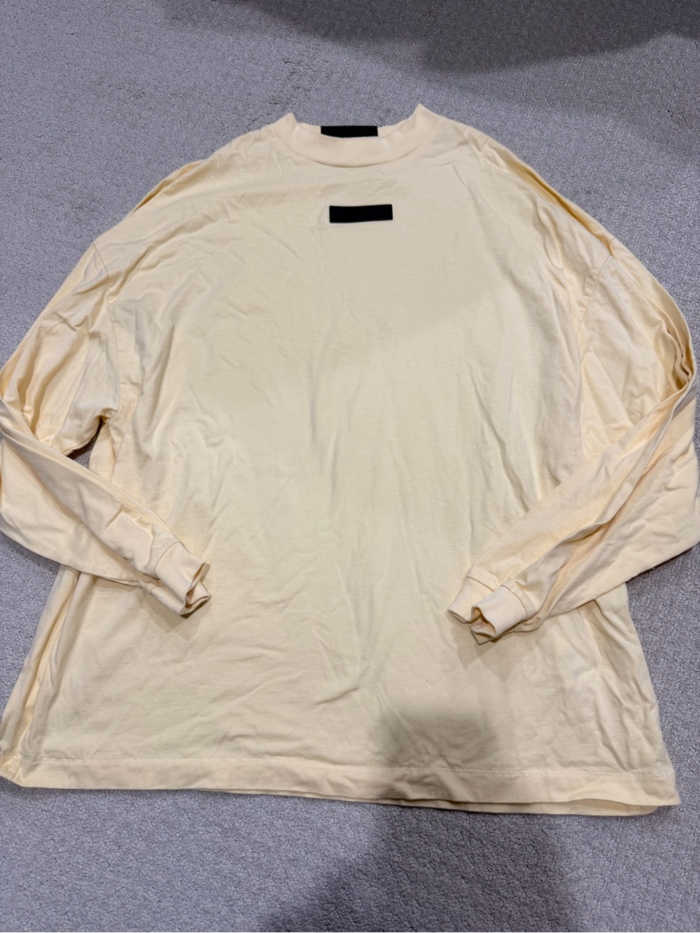 Essentials Men's Long-Sleeve Crewneck in Pale Yellow